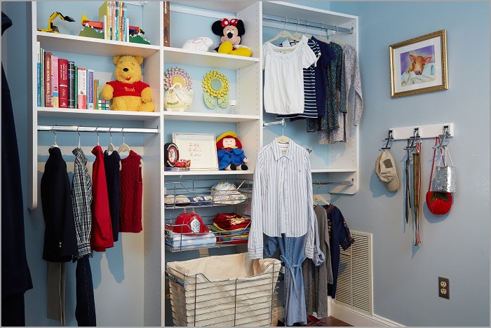 Teenage closet organized with hanging space and shoe racks