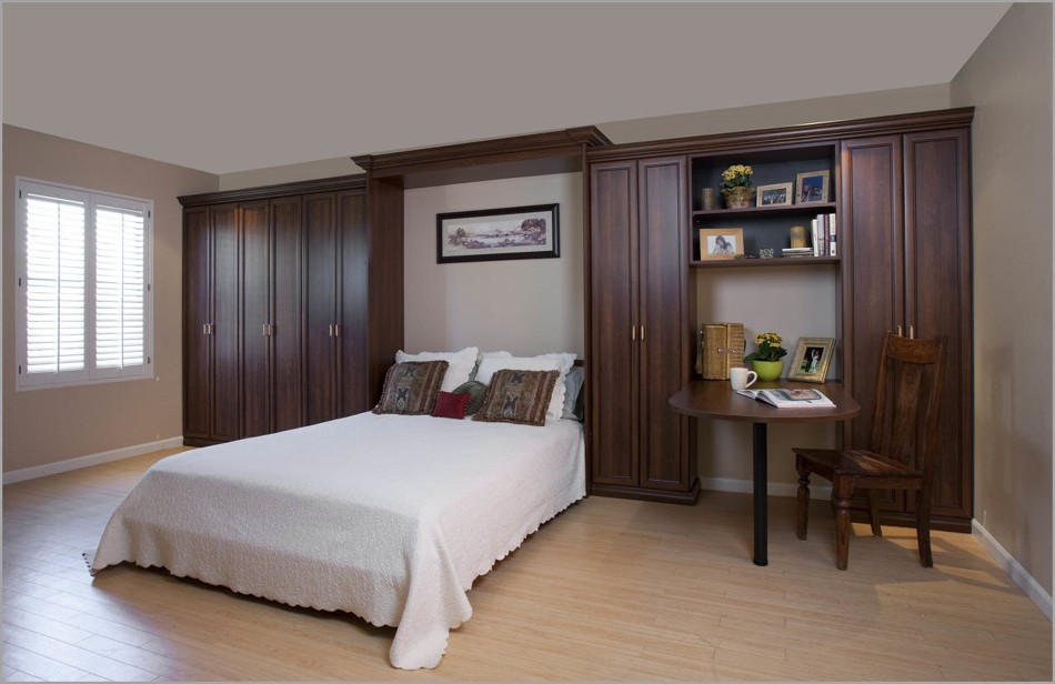 Custom bedroom with murphy bed and cabinets by tailored living