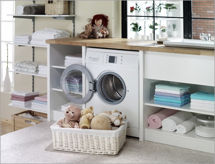 Custom laundry room with shelves and racks