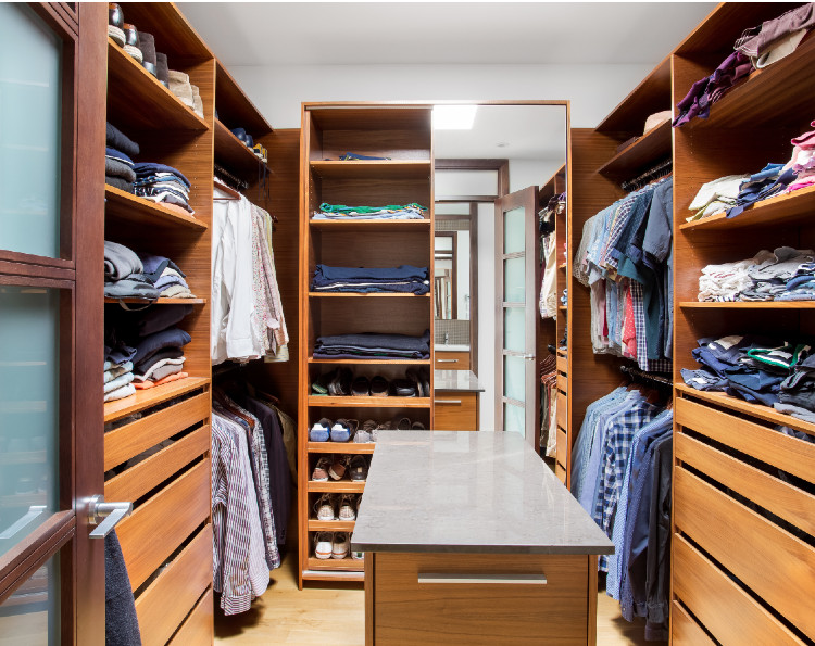 Fully organized closet with clothes and accessories