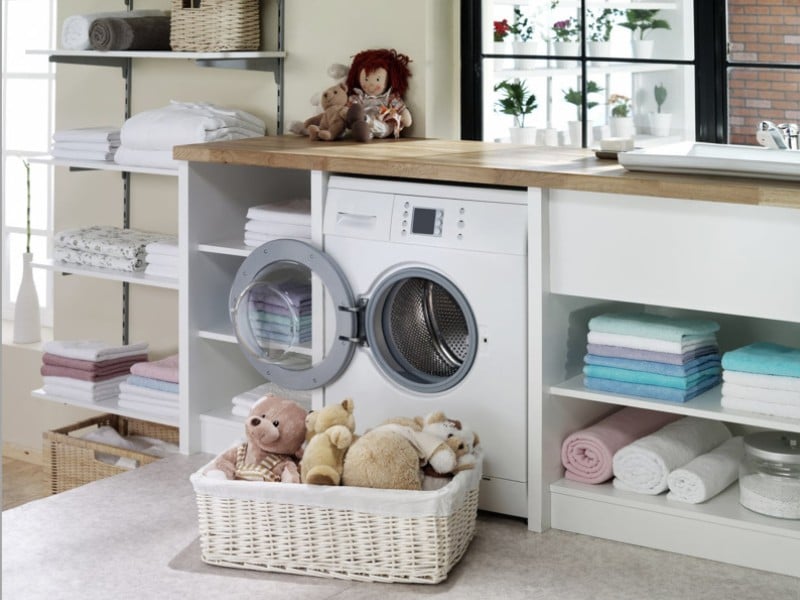 Custom organized laundry room design