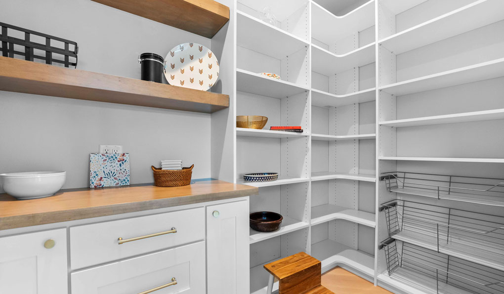 Custom pantry storage with open shelves and drawers for kitchen
